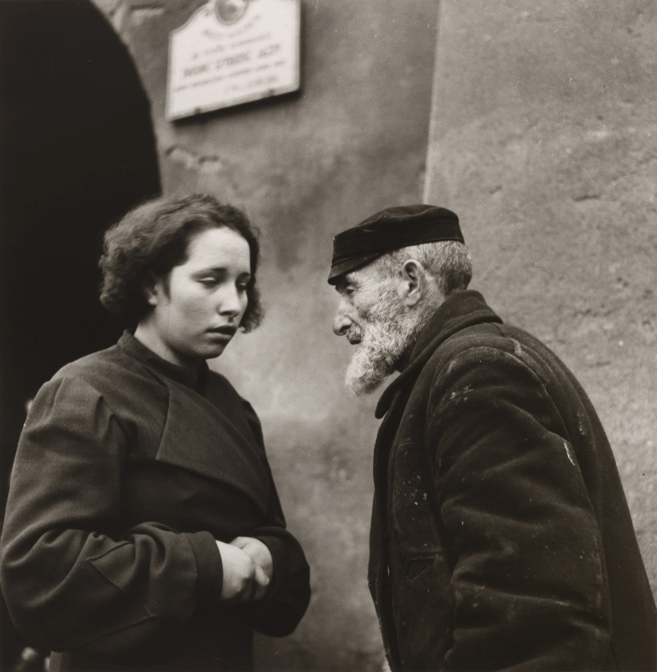 Roman Vishniac (United States, born Russia, 1897–1990), Granddaughter and Grandfather, Lublin, Poland, 1937, gelatin silver print, 10 5/8 x 10 5/16 inches. Portland Museum of Art, Maine, Promised Gift from the Judy Glickman Lauder Collection, 1.2000. © The Magnes Collection of Jewish Art and Life, UC Berkley