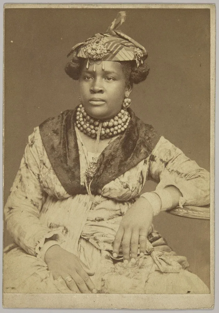 Unknown, Martinique Woman, circa 1890, albumen print, 5 3/4 × 4 inches. Art Gallery of Ontario. Montgomery Collection of Caribbean Photographs. Purchase, with funds from Dr. Liza & Dr. Frederick Murrell, Bruce Croxon & Debra Thier, Wes Hall & Kingsdale Advisors, Cindy & Shon Barnett, Donette Chin-Loy Chang, Kamala-Jean Gopie, Phil Lind & Ellen Roland, Martin Doc McKinney, Francilla Charles, Ray & Georgina Williams, Thaine & Bianca Carter, Charmaine Crooks, Nathaniel Crooks, Andrew Garrett & Dr. Belinda Longe, Neil L. Le Grand, Michael Lewis, Dr. Kenneth Montague & Sarah Aranha, Lenny & Julia Mortimore, and The Ferrotype Collective, 2019. 2019/2208. Photo © AGO.