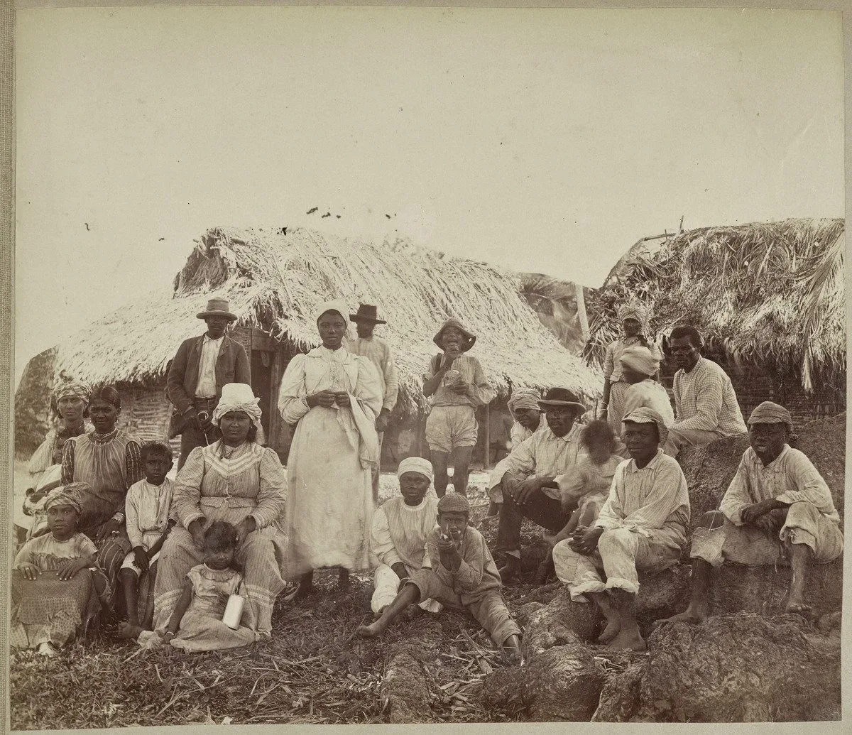 Unknown, Family at Home, Blue Mountains, Jamaica , circa 1890, albumen print, 9 3/4 × 13 11/16 inches. Art Gallery of Ontario. Gift of Patrick Montgomery, through the American Friends of the Art Gallery of Ontario Inc., 2019. 2019/3075. Photo © AGO.