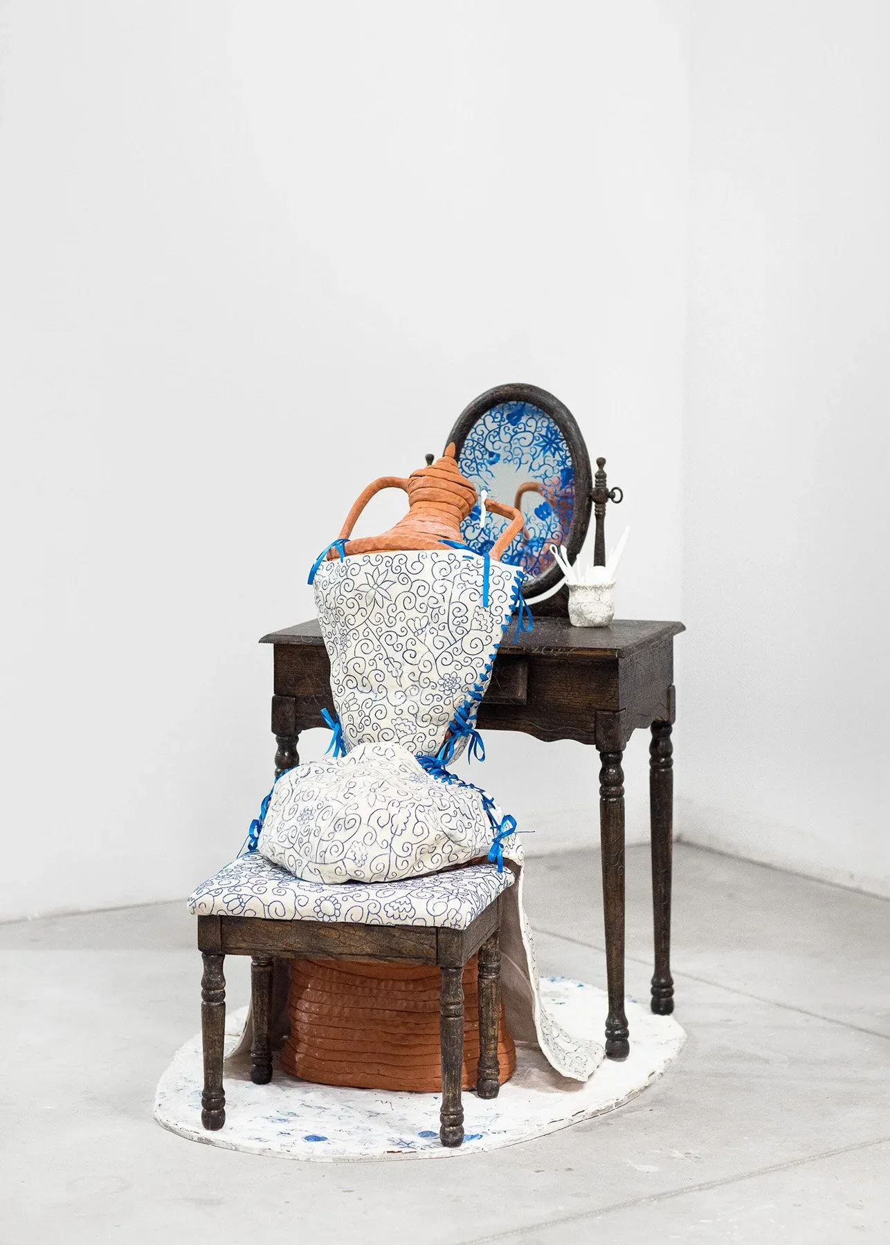 Elizabeth at Her Vanity Earthenware, porcelain, underglaze, ribbon, found objects, embroidery, and mosaic, 4′ x 6′ x 2.5′
