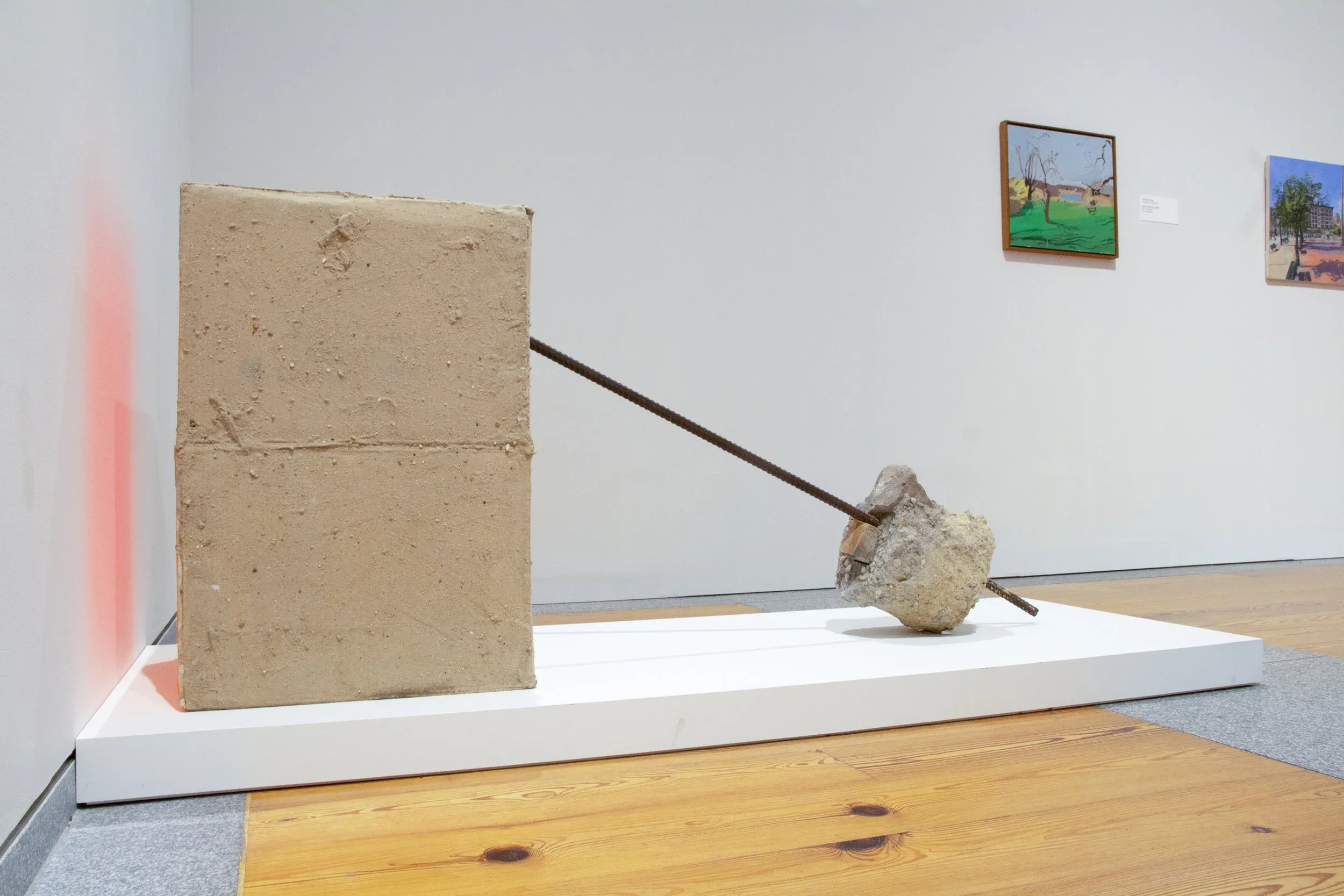 Robert Rauschenberg (United States, 1925–2008), Untitled (Early Egyptian) , 1973, sand on acrylic on cardboard with rebar and cement, 29 7/8 x 21 1/8 x 65 3/4 inches. Gift of the Alex Katz Foundation, 2022.27.6. ˝ Robert Rauschenberg Foundation.