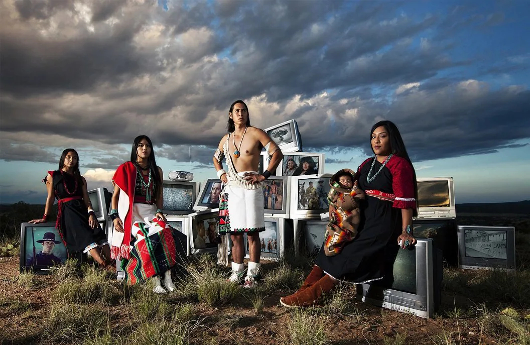 Cara Romero (Chemehuevi, born 1977), TV Indians, 2017, archival pigment print on Legacy Platine paper, 38 7/8 x 59 5/8 inches.